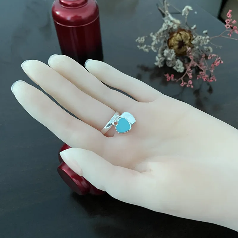 Ladies S925 Sterling Silver Classic Double Heart Shaped Blue Enamel Silver Ring Jewelry Couple Sweet Romantic Holiday Gift
Ladies S925 Sterling Silver Classic Double Heart Shaped Blue Enamel Silver Ring Jewelry Couple Sweet Romantic Holiday Gift