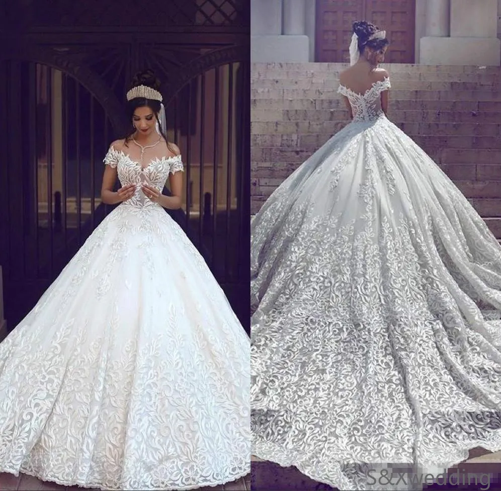 Saudi Arabic Dubai 2020 Luxury Short Sleeves Wedding Dresses Off Shoulder Appliques Backless With Sweep Train Bridal Gowns Robe
Saudi Arabic Dubai 2020 Luxury Short Sleeves Wedding Dresses Off Shoulder Appliques Backless With Sweep Train Bridal Gowns Robe