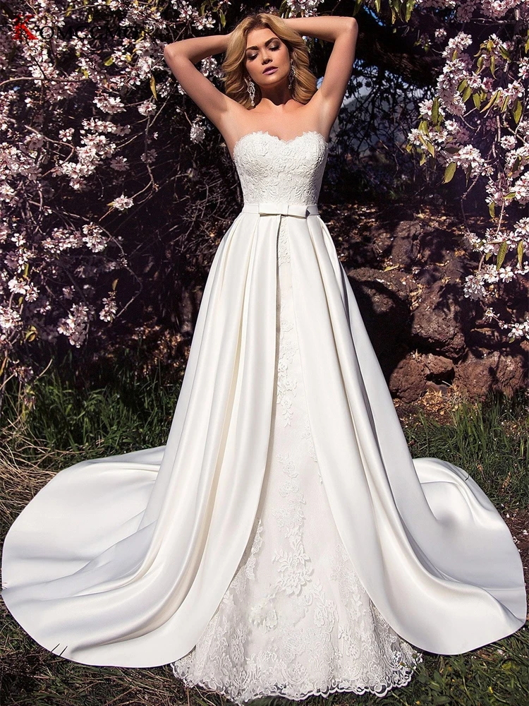 2021 New Arrival Strapless Embroidery Appliques Tulle Detachable Train 2 IN 1 Bridal Gown Elegant Sleeveless Wedding Dress
2021 New Arrival Strapless Embroidery Appliques Tulle Detachable Train 2 IN 1 Bridal Gown Elegant Sleeveless Wedding Dress