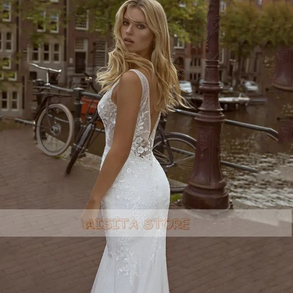 Sexy Mermaid Weddding Dresses 2021 Deep V Neck Lace Appliques Sleeveless Backless Tulle Court Train Beach Bridal Gowns Custom
Sexy Mermaid Weddding Dresses 2021 Deep V Neck Lace Appliques Sleeveless Backless Tulle Court Train Beach Bridal Gowns Custom