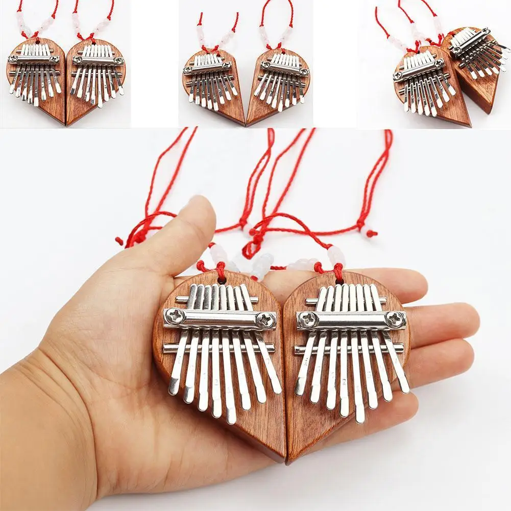 Mini 8 Key Heart Shape Kalimba Crystal & Mahogany Thumb Piano Decoration Instrument Best Gift For Friend Children
Mini 8 Key Heart Shape Kalimba Crystal & Mahogany Thumb Piano Decoration Instrument Best Gift For Friend Children