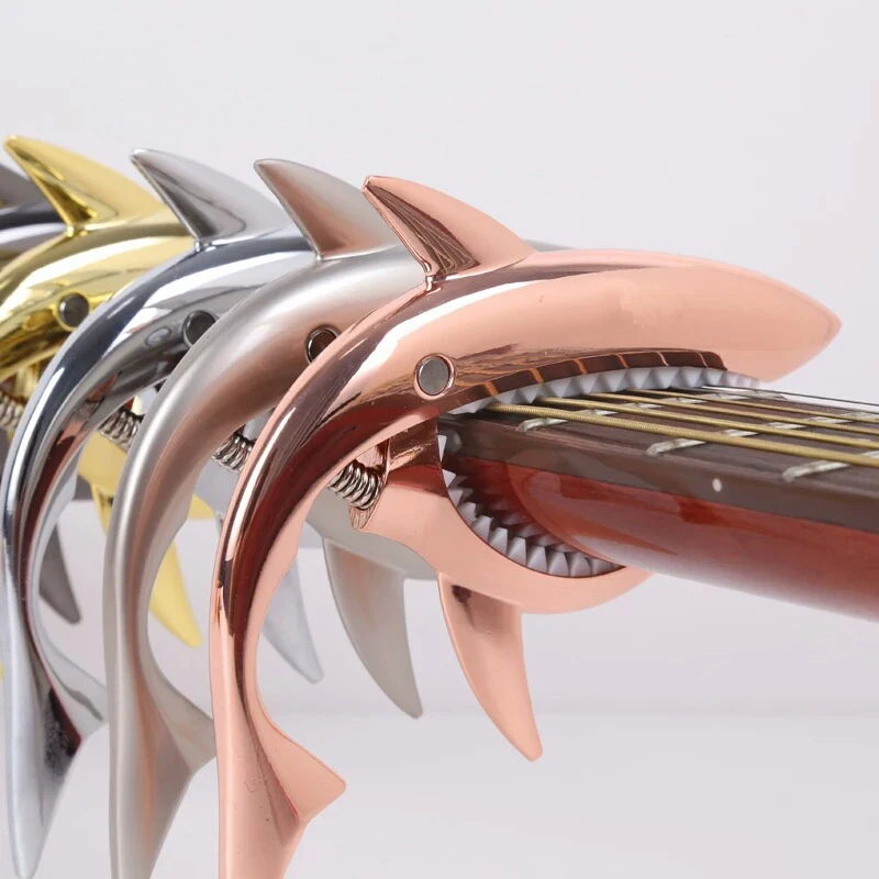 Гитарный каподастр для акустической электрической гитары аксессуары для музыкальных инструментов акула
Гитарный каподастр для акустической электрической гитары аксессуары для музыкальных инструментов акула