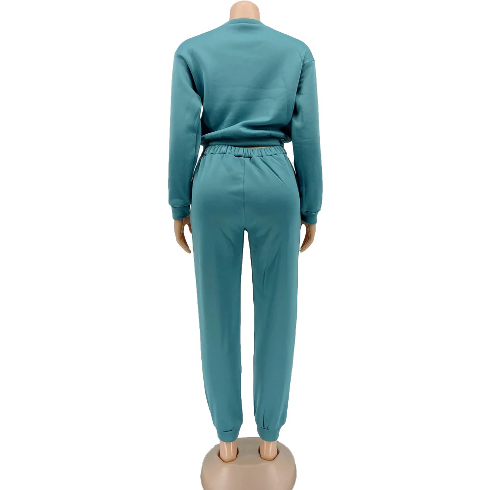 New European casual letter printed women's sports suit fashion o-neck long sleeve T-shirt and trousers 2-piece set
New European casual letter printed women's sports suit fashion o-neck long sleeve T-shirt and trousers 2-piece set