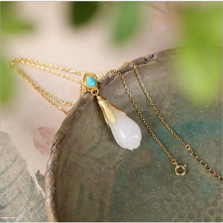 Sterling Silver Gilding Inlaid Hetian Jade Orchid Pendant Women's Fashion Gold Plated White Magnolia Turquoise Pendant Clavicle
Sterling Silver Gilding Inlaid Hetian Jade Orchid Pendant Women's Fashion Gold Plated White Magnolia Turquoise Pendant Clavicle
