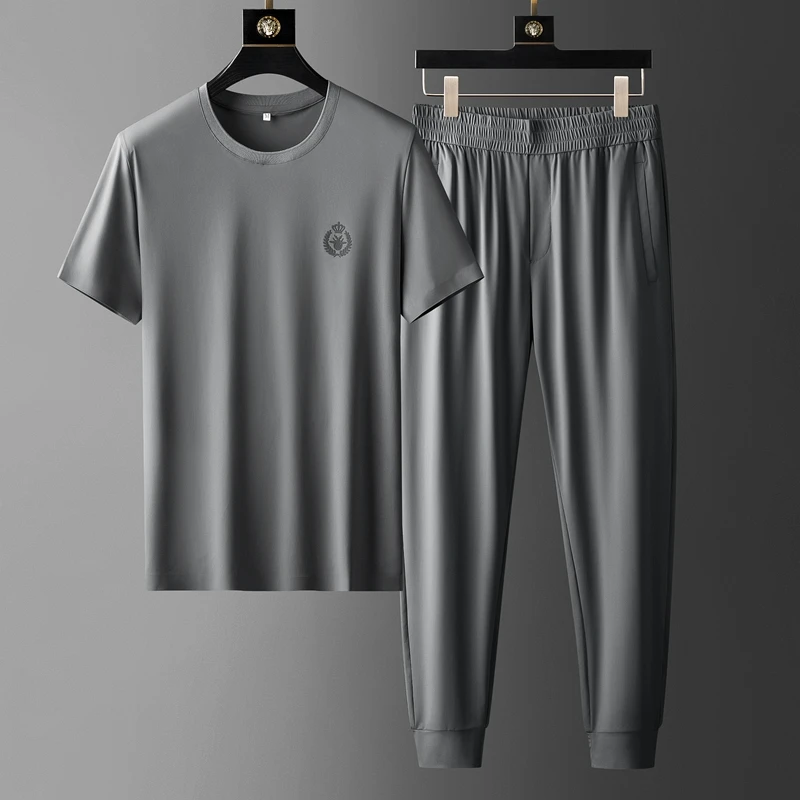 High end Silky Summer suit men's ultra thin ice silk elastic fabric breathable hollow men's sports leisure two piece set
High end Silky Summer suit men's ultra thin ice silk elastic fabric breathable hollow men's sports leisure two piece set