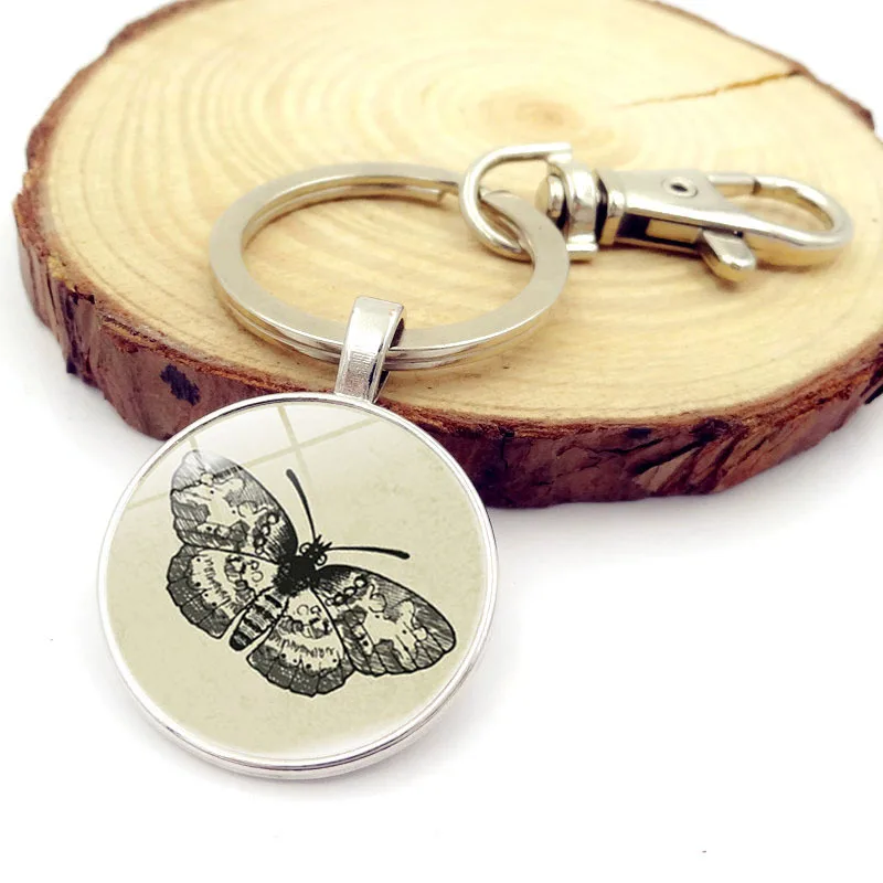 CIBOCIBO Butterfly Print Keychain For Men New Fashion Round Keychain Luxury Classic Silver Color Jewelry Keychain For Women Gift
CIBOCIBO Butterfly Print Keychain For Men New Fashion Round Keychain Luxury Classic Silver Color Jewelry Keychain For Women Gift