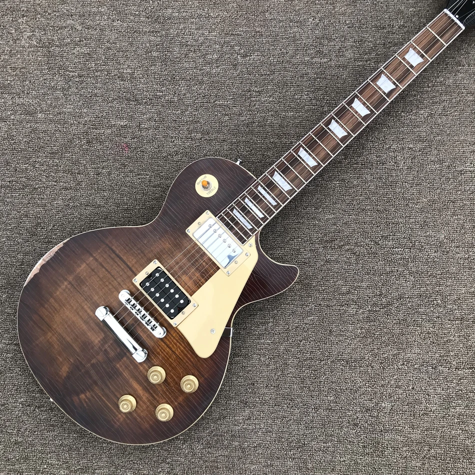 Relic electric guitar, Tobacco burst maple top, Tune-o-Matic bridge, Solid mahogany body guitar, Free shipping
Relic electric guitar, Tobacco burst maple top, Tune-o-Matic bridge, Solid mahogany body guitar, Free shipping