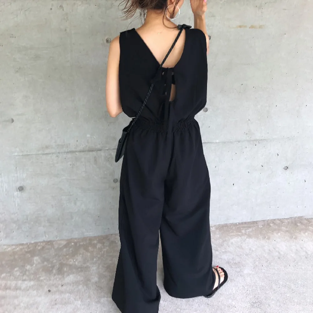 Women Summer Sleveless Jumpsuit Plain Button Trousers Simple Ladies Fashion Loose Back Lace Up Casual Black Female One Piece 
Women Summer Sleveless Jumpsuit Plain Button Trousers Simple Ladies Fashion Loose Back Lace Up Casual Black Female One Piece