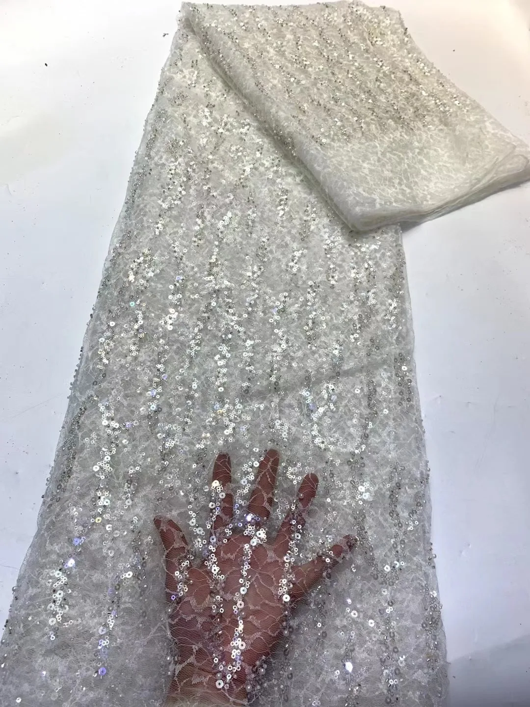 Pure White African Mesh Lace Fabric Latest Design High Quality Sequins French Tulle Lace Fabric Beads For Nigeria Wedding Party 
Pure White African Mesh Lace Fabric Latest Design High Quality Sequins French Tulle Lace Fabric Beads For Nigeria Wedding Party