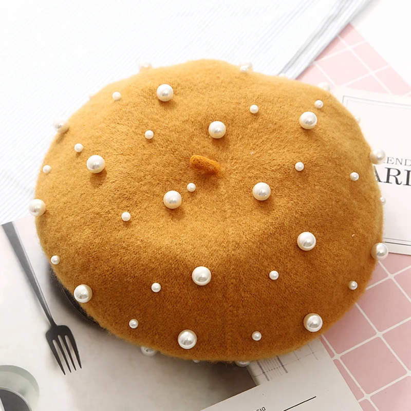 2020 new Wool Women Winter Berets Female Cashmere Warm Beret Hats Pearl Rivet Vintage Girls Flat Cap Luxury Beading Elegant Hat
2020 new Wool Women Winter Berets Female Cashmere Warm Beret Hats Pearl Rivet Vintage Girls Flat Cap Luxury Beading Elegant Hat