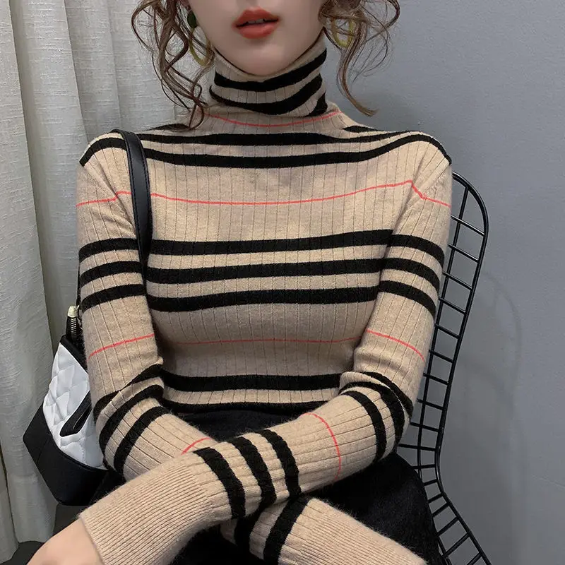 Autumn and winter 2021 new Korean color matching striped T-shirt high neck Pullover women's slim bottom shirt
Autumn and winter 2021 new Korean color matching striped T-shirt high neck Pullover women's slim bottom shirt