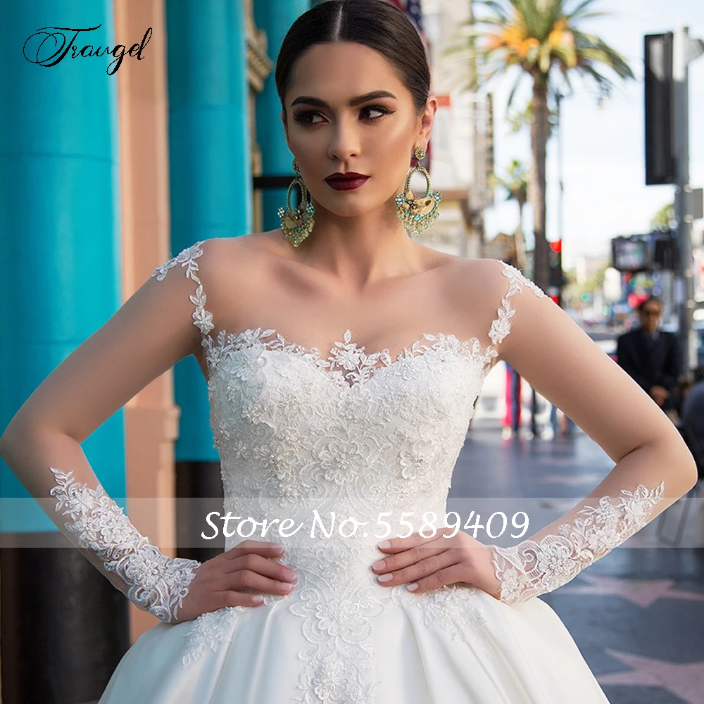 Traugel vestidos de novia Illusion Long Sleeve Satin Wedding Dresses Luxury Applique Button Cathedral Train A Line Bridal Gown
Traugel vestidos de novia Illusion Long Sleeve Satin Wedding Dresses Luxury Applique Button Cathedral Train A Line Bridal Gown