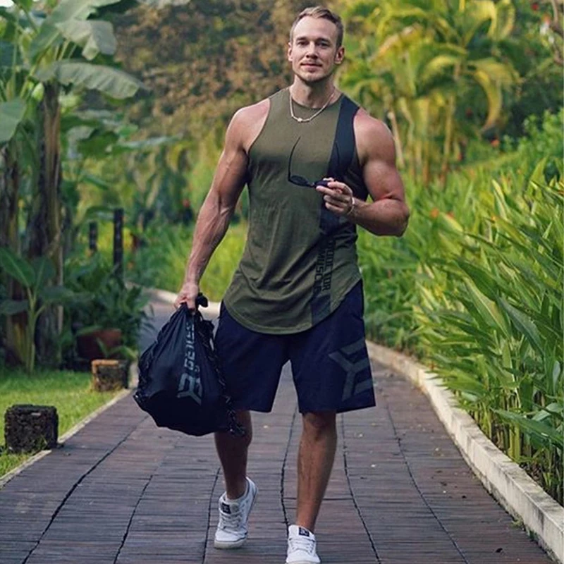 European and American summer new trend men's sports fitness vest fast drying running training clothes slim casual top 
European and American summer new trend men's sports fitness vest fast drying running training clothes slim casual top