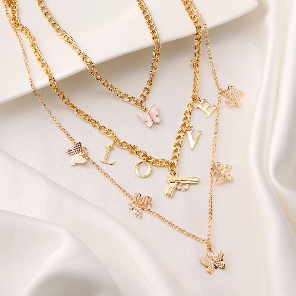 2021 new women's neck chain butterfly multi-layer letter pistol pendant necklace Jewelry on the neck
2021 new women's neck chain butterfly multi-layer letter pistol pendant necklace Jewelry on the neck