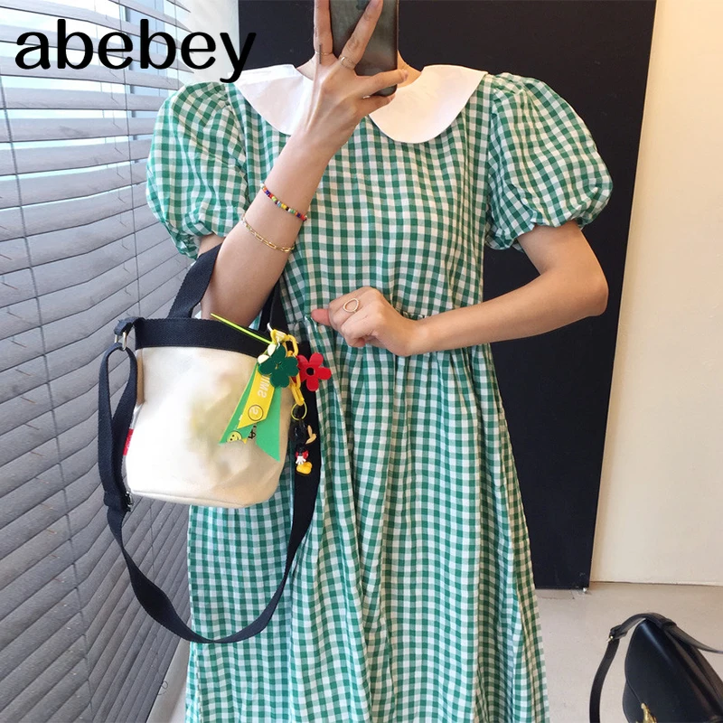 New Summer Women Fashion All-match doll collar puff sleeve Dress high waist slim ruched plaid Dress 2021
New Summer Women Fashion All-match doll collar puff sleeve Dress high waist slim ruched plaid Dress 2021