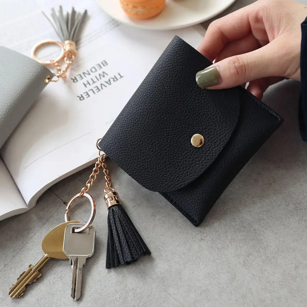 Fashion Tassels Short Wallet Bag for Women PU Leather Clutch Bags Cute Korean Card Holder Female Folding Small Coin Purse Bolsas
Fashion Tassels Short Wallet Bag for Women PU Leather Clutch Bags Cute Korean Card Holder Female Folding Small Coin Purse Bolsas