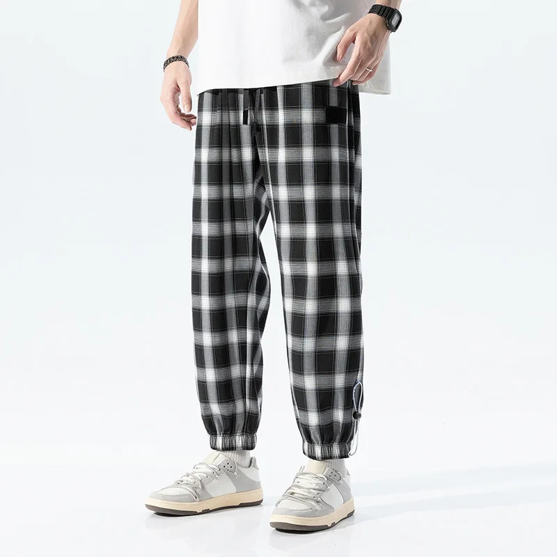 2020 Hot Black and White Plaid Pants Hong Kong Fashion Checkered Pants Men's Casual Loose Large Couple Sports Harlan Men's Wear
2020 Hot Black and White Plaid Pants Hong Kong Fashion Checkered Pants Men's Casual Loose Large Couple Sports Harlan Men's Wear
