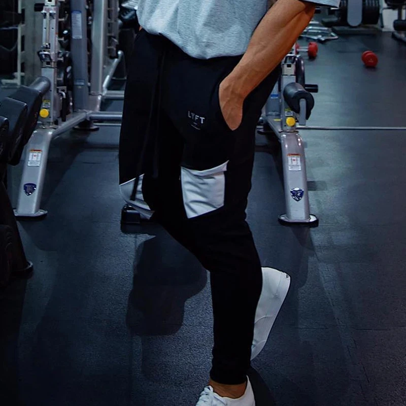 Mens Jogging Pants Fitness Men Sportswear Tracksuit Casual Bottoms Skinny Sweatpants Trousers Gyms Jogger Track Pants
Mens Jogging Pants Fitness Men Sportswear Tracksuit Casual Bottoms Skinny Sweatpants Trousers Gyms Jogger Track Pants