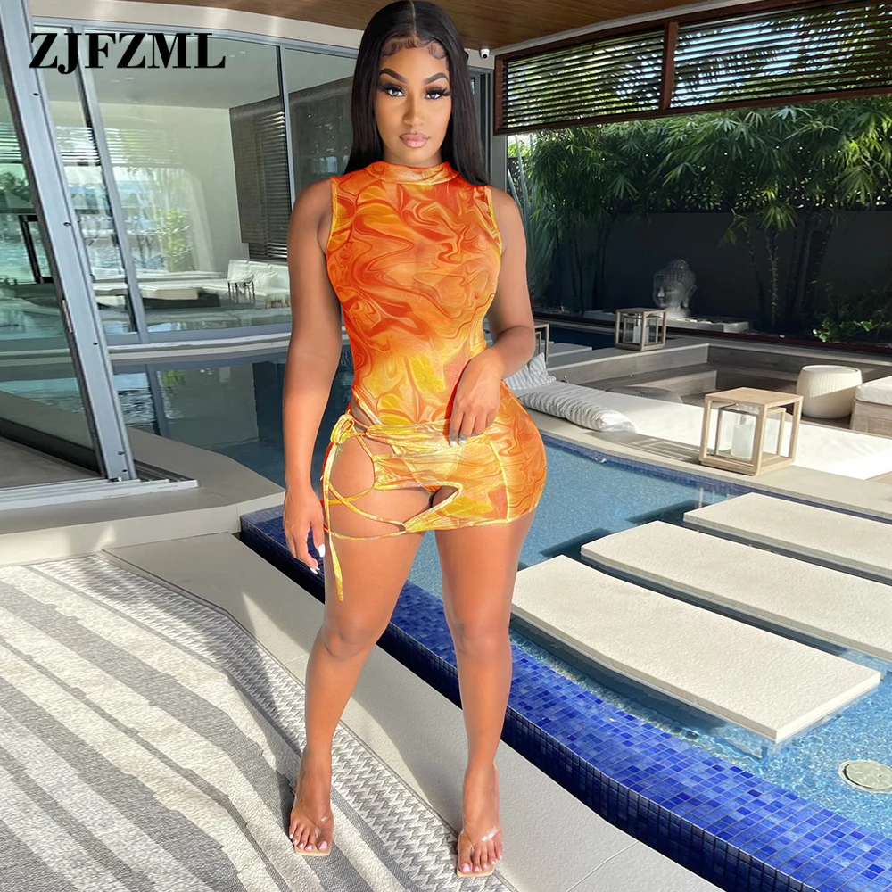 Women's Two Piece Dress Sets Sheer Mesh Aesthetic Print Sleeveless One Piece Bodysuits and Lace Up Hollow Sheath Skirt Outfits 
Women's Two Piece Dress Sets Sheer Mesh Aesthetic Print Sleeveless One Piece Bodysuits and Lace Up Hollow Sheath Skirt Outfits