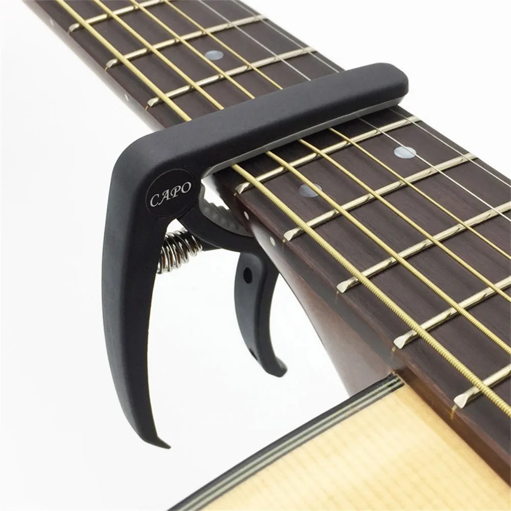 Universal Guitar Capo Quick Change Clamp Key Plastic Capo For Acoustic Classic 6 String Acoustic Parts Light Weight Accessories
Universal Guitar Capo Quick Change Clamp Key Plastic Capo For Acoustic Classic 6 String Acoustic Parts Light Weight Accessories