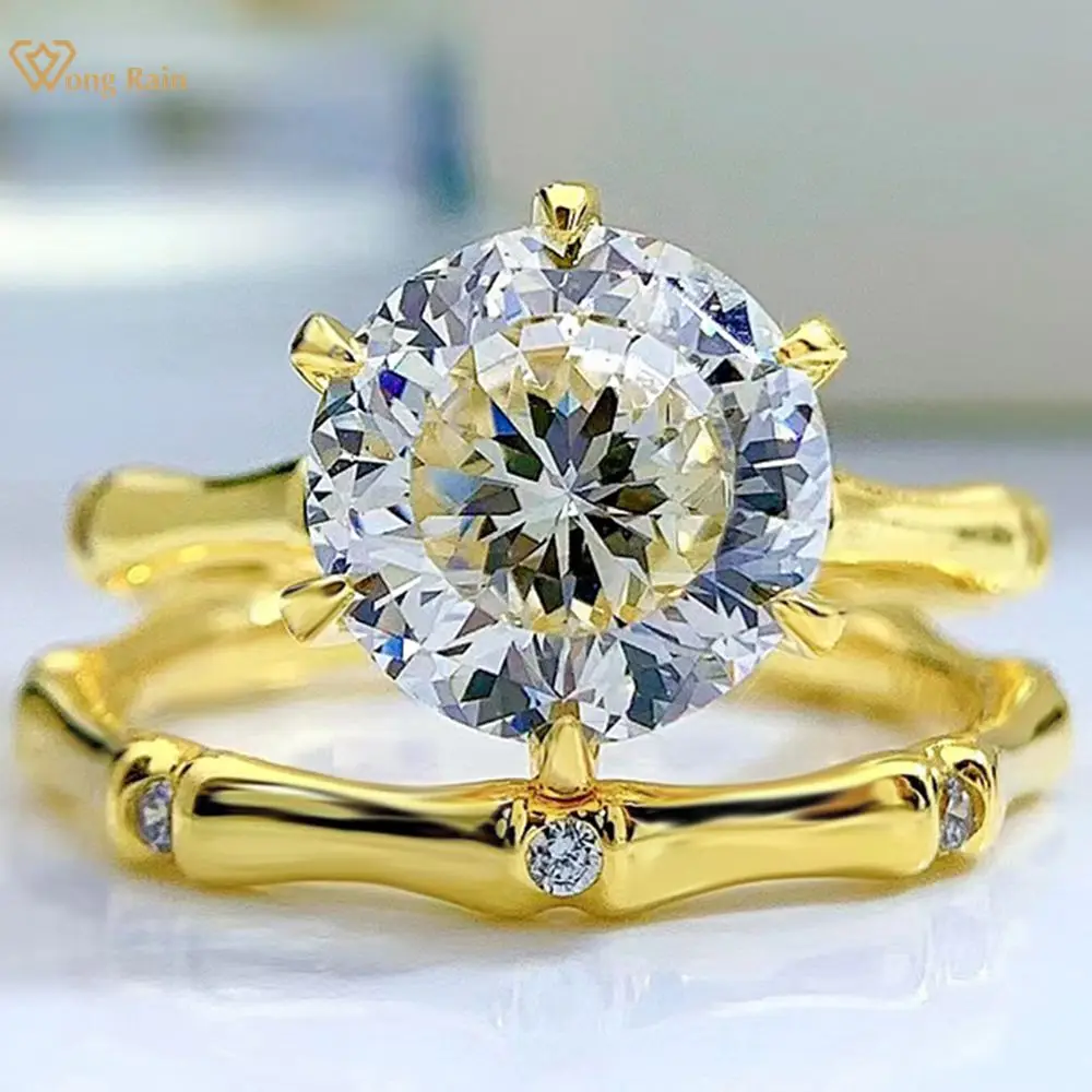 Wong Rain 925 Sterling Silver Round Cut 10 MM Created Moissanite Gemstone Anniversary Personality Ring Set Fine Jewelry Gift
Wong Rain 925 Sterling Silver Round Cut 10 MM Created Moissanite Gemstone Anniversary Personality Ring Set Fine Jewelry Gift