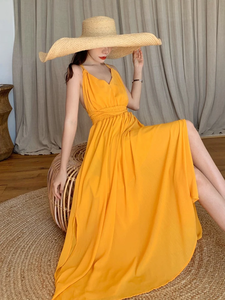 Beach Dress 2021 New Summer Fairy Yellow Backless Dress With Slit Beach Vacation Strappy Long Dress V-Neck Sleeveless Bohemian
Beach Dress 2021 New Summer Fairy Yellow Backless Dress With Slit Beach Vacation Strappy Long Dress V-Neck Sleeveless Bohemian