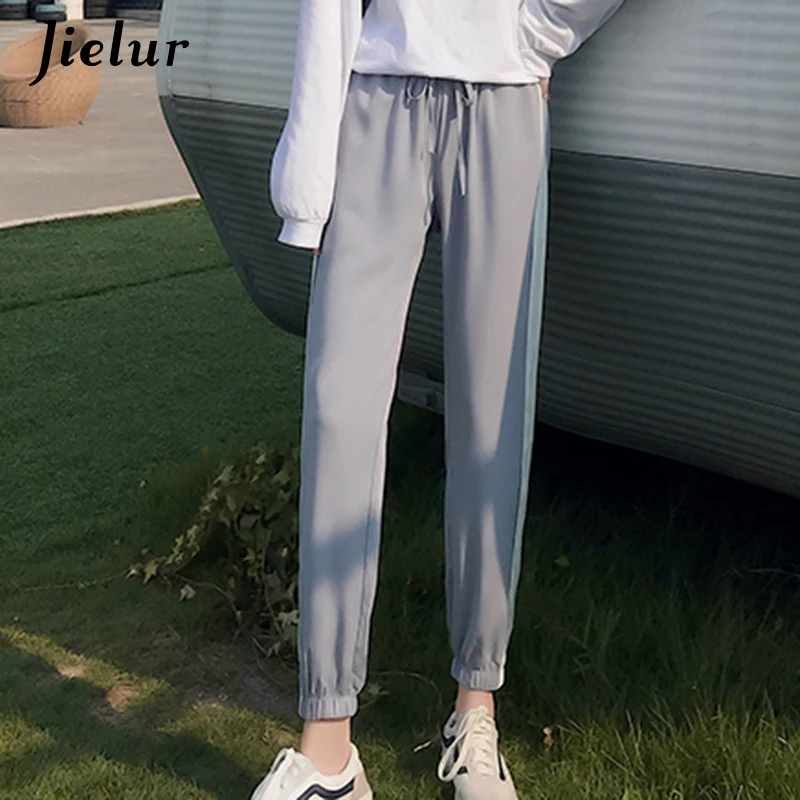 Jielur New Black Khaki Trousers Harem Pants Sport Loose Casual Pants Female Drawstring Side-striped Women's Sweatpants M-XXL 
Jielur New Black Khaki Trousers Harem Pants Sport Loose Casual Pants Female Drawstring Side-striped Women's Sweatpants M-XXL