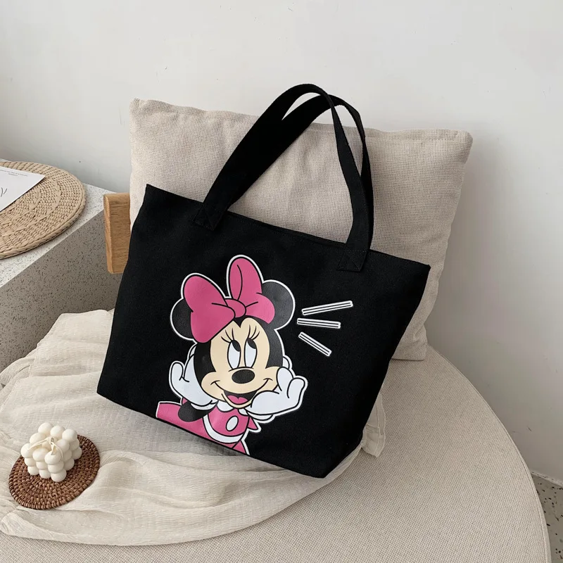 Disney cartoon Mickey Minnie high-capacity student art canvas ladies shoulder bag wild travel shopping storage bag
Disney cartoon Mickey Minnie high-capacity student art canvas ladies shoulder bag wild travel shopping storage bag