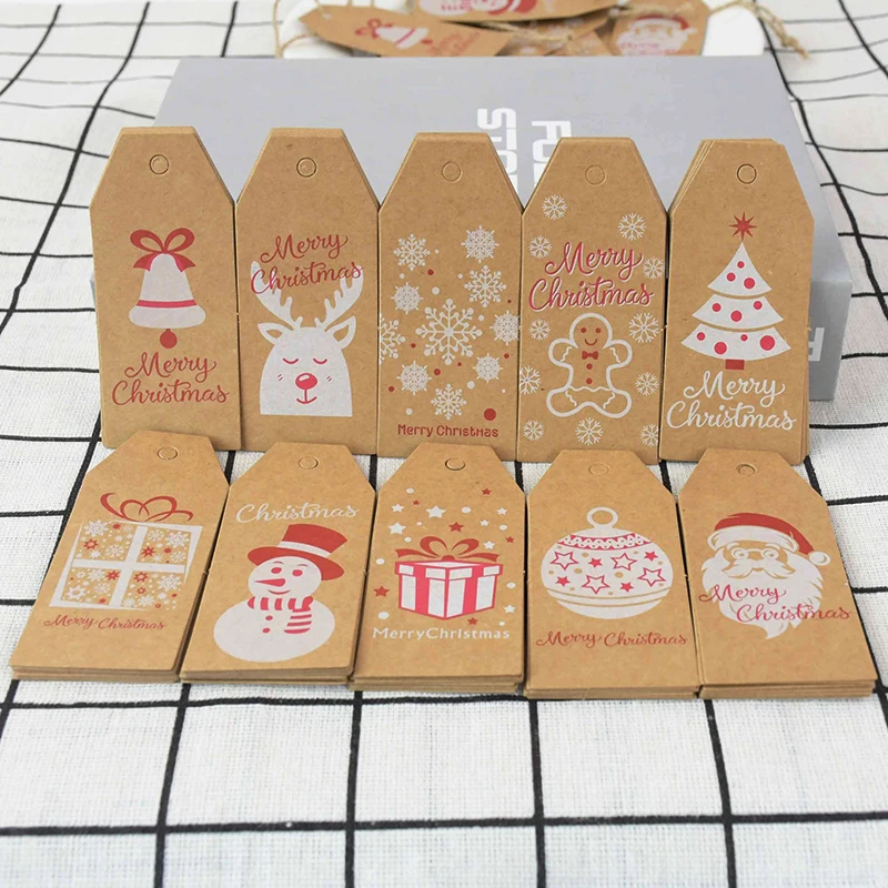

100pcs Merry Christmas Tags Santa Claus Snowflake Kraft Paper Gift Tag Candy Packaging Label New Year Xmas Tree Hanging Ornament