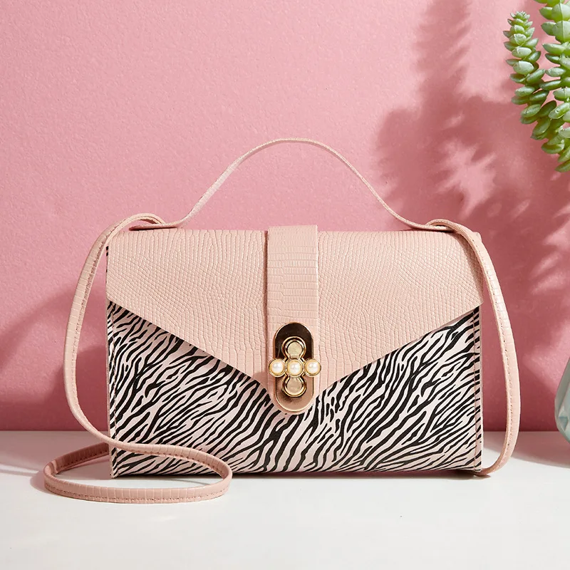 2021women's bag.New Urban Simple messenger bag.Zebra pattern aesthetic purses and handbags.Texture pearl shoulder bag
2021women's bag.New Urban Simple messenger bag.Zebra pattern aesthetic purses and handbags.Texture pearl shoulder bag