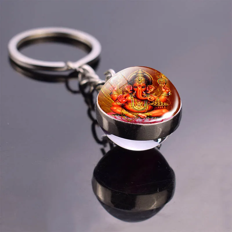 Hamsa Hand Keychain Indian Buddha Ganesha Art Glass Ball Double Side Key Chain Pendant Key Ring Indian Spiritual Jewelry
Hamsa Hand Keychain Indian Buddha Ganesha Art Glass Ball Double Side Key Chain Pendant Key Ring Indian Spiritual Jewelry