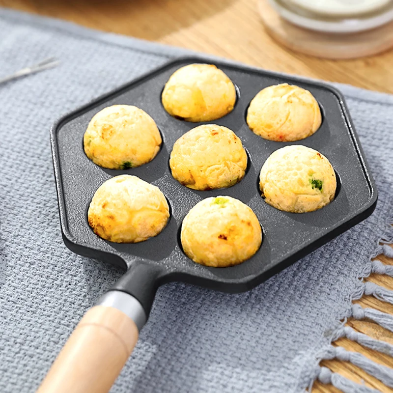 Чугунная кастрюля Takoyaki, кастрюля для гриля с 7 отверстиями и мячом-Осьминогом, кастрюля Aebleskiver с деревянной ручкой, кухонные принадлежности
Чугунная кастрюля Takoyaki, кастрюля для гриля с 7 отверстиями и мячом-Осьминогом, кастрюля Aebleskiver с деревянной ручкой, кухонные принадлежности