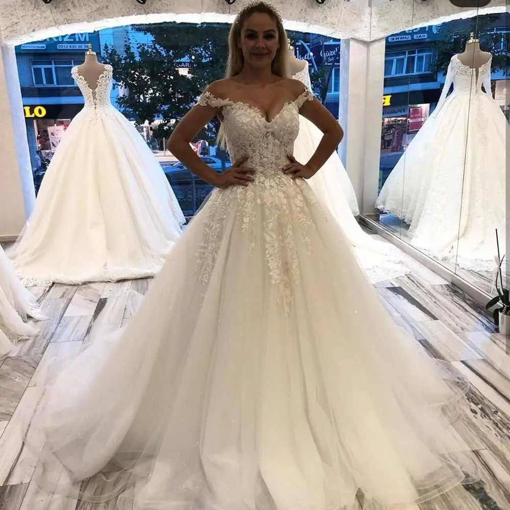 2021 Off Shoulder Lace Appliques Wedding Dresses for Bride Ball Gown Beaded Wedding Bridal Gowns vestido de noiva
2021 Off Shoulder Lace Appliques Wedding Dresses for Bride Ball Gown Beaded Wedding Bridal Gowns vestido de noiva