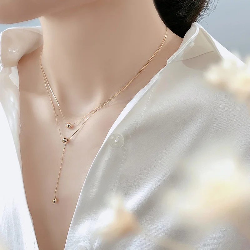 Small Golden Bean Double-layer Tassel Pendant Necklace for Women Fashion Metal Choker Necklaces Clavicle Chain Jewelry Gift
Small Golden Bean Double-layer Tassel Pendant Necklace for Women Fashion Metal Choker Necklaces Clavicle Chain Jewelry Gift
