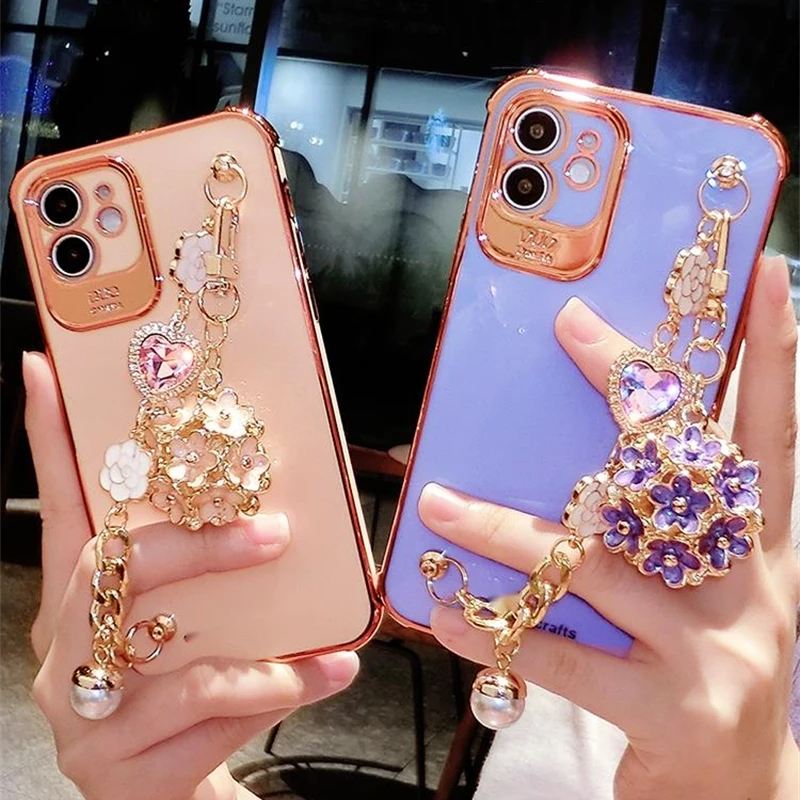 Luxury Plating Glitter Bling Camellia Gem Bracelet Flower Pendant Phone Case For IPhone 12 11 Pro XS MAX XR X 7 8 Plus Cover
Luxury Plating Glitter Bling Camellia Gem Bracelet Flower Pendant Phone Case For IPhone 12 11 Pro XS MAX XR X 7 8 Plus Cover