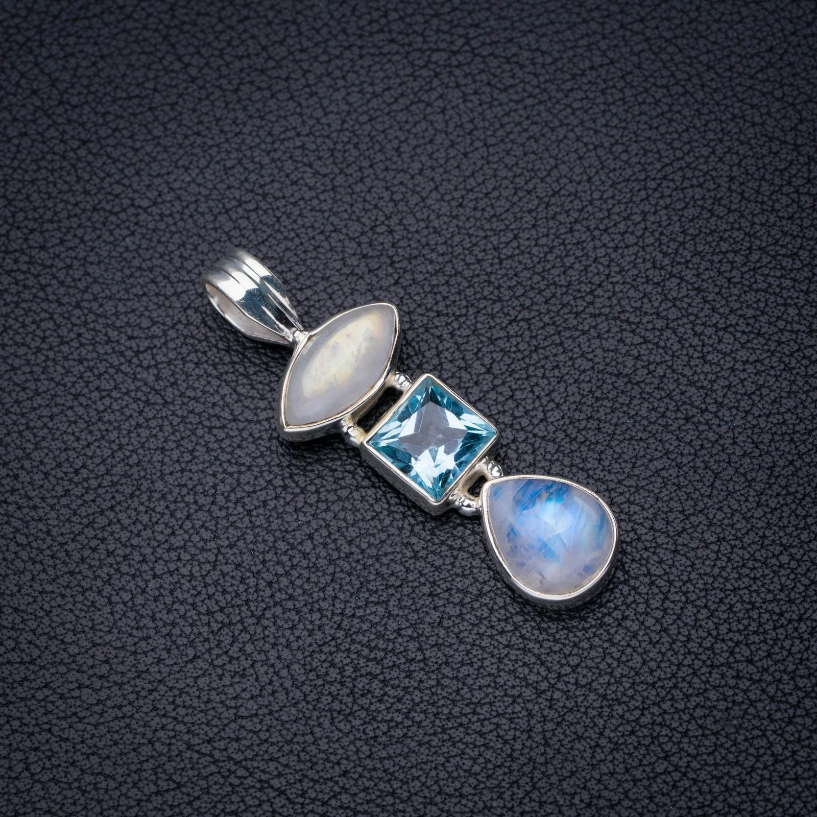 StarGems Natural Rainbow Moonstone Blue Topaz Handmade 925 Sterling Silver Pendant 1.75" E3838
StarGems Natural Rainbow Moonstone Blue Topaz Handmade 925 Sterling Silver Pendant 1.75" E3838