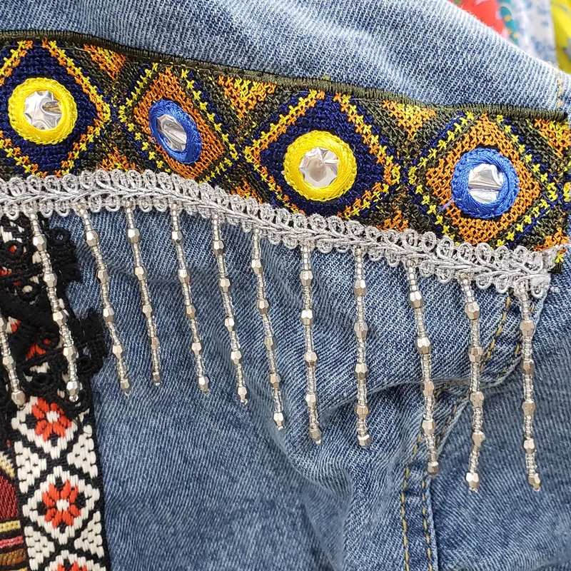 2019 Autumn New Retro National Style Women Heavy Embroidery Tassel Jeans Coat Loose Bf Denim Jacket Students Short Coat Outwear
2019 Autumn New Retro National Style Women Heavy Embroidery Tassel Jeans Coat Loose Bf Denim Jacket Students Short Coat Outwear