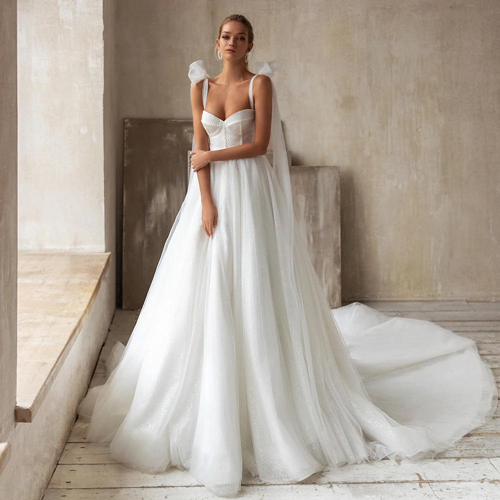 Charming Spaghetti Straps Strapless Wedding Dresses Sleeveless A-Line Floor-Length with Tulle Lace- Zipper Back Sweep Train 2021
Charming Spaghetti Straps Strapless Wedding Dresses Sleeveless A-Line Floor-Length with Tulle Lace- Zipper Back Sweep Train 2021