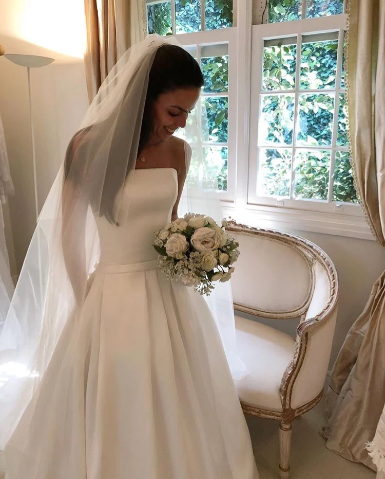 White Ivory Wedding Dresses Simple Boho A-line Strapless Satin Princess Bridal Dress Bow Sashes Sexy Backless Wedding Gowns 2022
White Ivory Wedding Dresses Simple Boho A-line Strapless Satin Princess Bridal Dress Bow Sashes Sexy Backless Wedding Gowns 2022