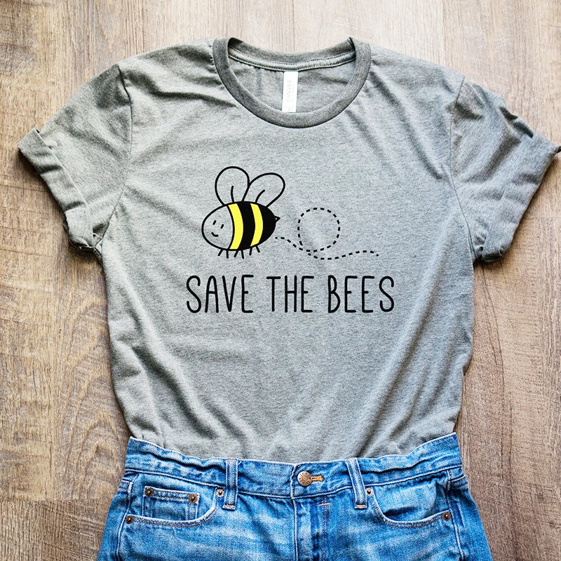 Save The Bees Graphic T Shirts Short Sleeve Cotton Tops Aesthetic High Street O-Neck T-shirt Women Help More Bees Tee Drop Ship 
Save The Bees Graphic T Shirts Short Sleeve Cotton Tops Aesthetic High Street O-Neck T-shirt Women Help More Bees Tee Drop Ship