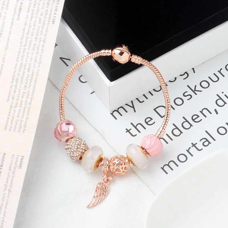 Rose Gold Angel's Wings Feather Charm Bracelet Pink Glass Beads Bracelet Diy Jewelry for Women 
Rose Gold Angel's Wings Feather Charm Bracelet Pink Glass Beads Bracelet Diy Jewelry for Women