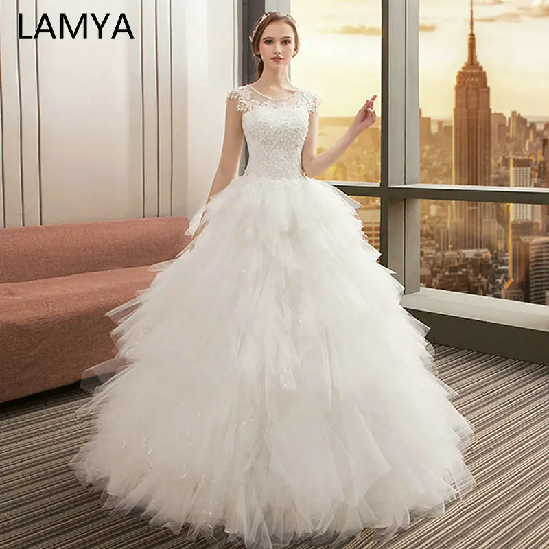 LAMYA TuTu Wedding Dresses O Neck Appliques Bridal Gown Bohemian Long Lace Up Vestido De Noiva White Wed Dress
LAMYA TuTu Wedding Dresses O Neck Appliques Bridal Gown Bohemian Long Lace Up Vestido De Noiva White Wed Dress