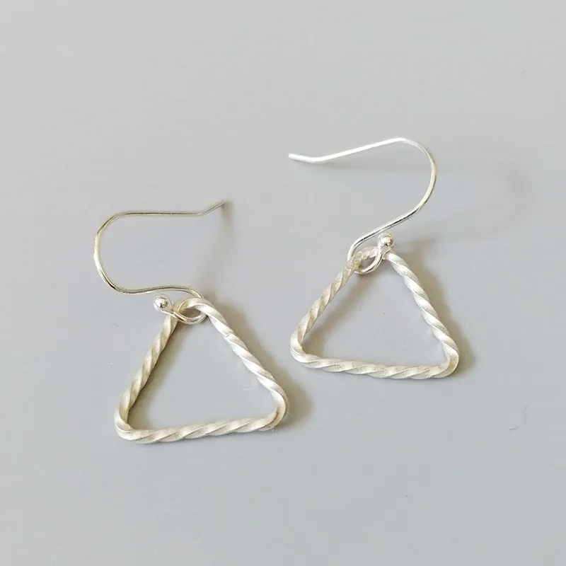 925 Sterling Silver European and American Handmade Twist Triangle Earrings Minimalist Silver Earrings For Women
925 Sterling Silver European and American Handmade Twist Triangle Earrings Minimalist Silver Earrings For Women