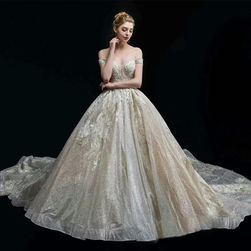 2021 New Arrivals V-Neck Long Sleeve Bridal Gown Shiny Light Champagne Ball Gown Wedding Dresses
2021 New Arrivals V-Neck Long Sleeve Bridal Gown Shiny Light Champagne Ball Gown Wedding Dresses