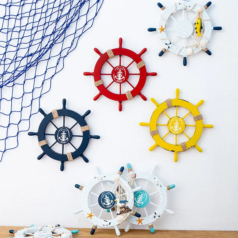 Mediterranean decorative ornaments hanging crack foreign trade wooden rudder wall mounted mini helmsman
Mediterranean decorative ornaments hanging crack foreign trade wooden rudder wall mounted mini helmsman
