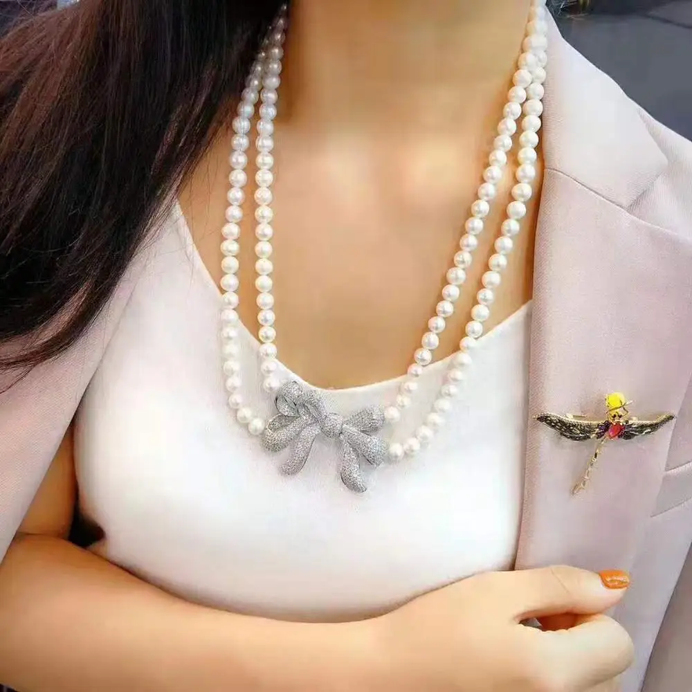 Hand knotted 70-75cm 7-8mm white freshwater pearl butterfly micro inlay zircon accessories necklace
Hand knotted 70-75cm 7-8mm white freshwater pearl butterfly micro inlay zircon accessories necklace