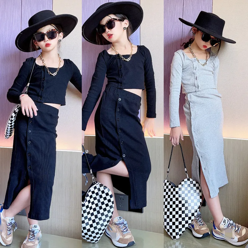 Комплект из двух предметов для девочек, трикотажный однотонный кроп-топ и юбка миди, на пуговицах, с разрезом, для детей 4-14 лет
Комплект из двух предметов для девочек, трикотажный однотонный кроп-топ и юбка миди, на пуговицах, с разрезом, для детей 4-14 лет