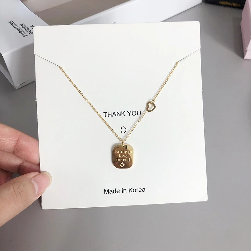 Fashion net celebrity high-end titanium steel pendant necklace Korean version of the new simple checkered letter love jewelry
Fashion net celebrity high-end titanium steel pendant necklace Korean version of the new simple checkered letter love jewelry