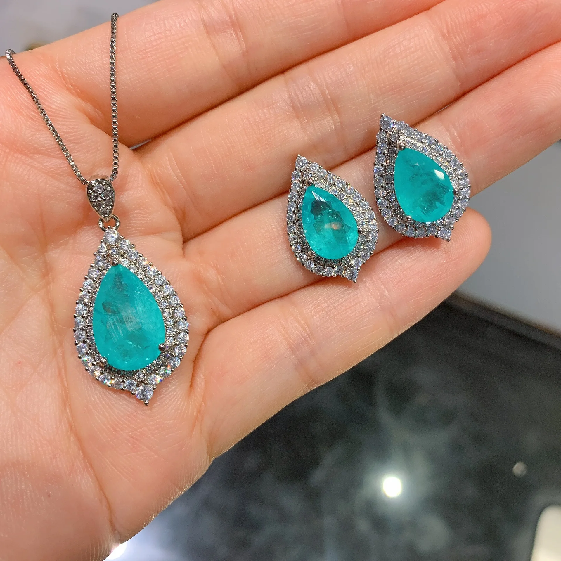 QTT 925 Sterling Silver Chain Necklace Earrings Bridal Sets Fashion Paraiba Water Drop Tourmaline Gemstone Jewelry Ladies Set 
QTT 925 Sterling Silver Chain Necklace Earrings Bridal Sets Fashion Paraiba Water Drop Tourmaline Gemstone Jewelry Ladies Set