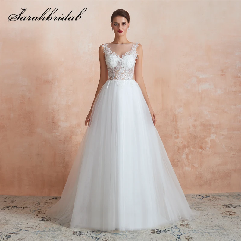 Sexy Wedding Dresses 3 Layers A Line Sheer Button Sleeveless Sweep Train Tulle Applique Lace Bridal Gown Vestido De Noiva 28371
Sexy Wedding Dresses 3 Layers A Line Sheer Button Sleeveless Sweep Train Tulle Applique Lace Bridal Gown Vestido De Noiva 28371